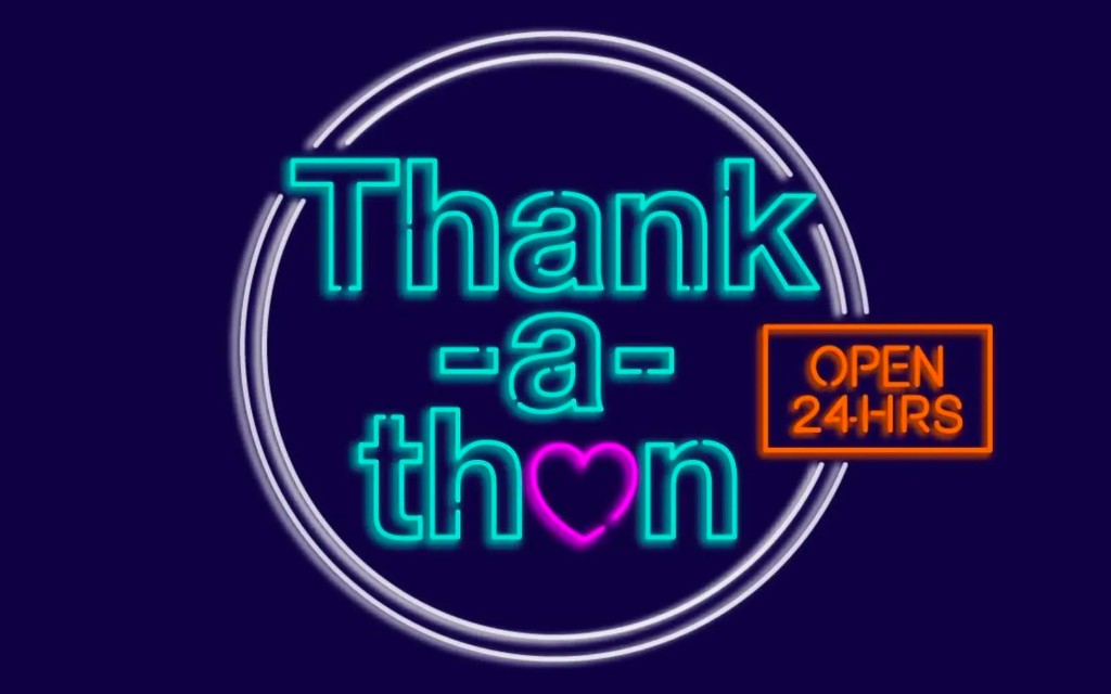 Neon Thank-a-thon sign with a pink heart and an OPEN 24-HRS badge